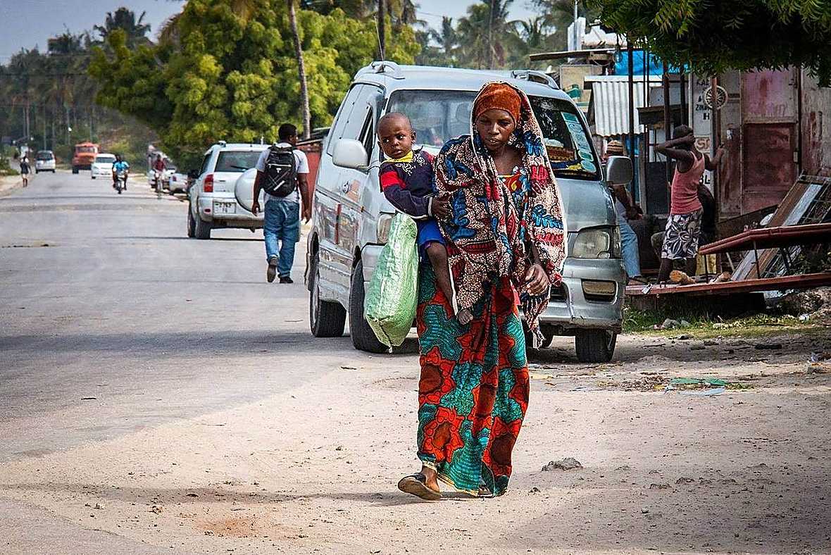 Bright palm-lined road across Zanzibar